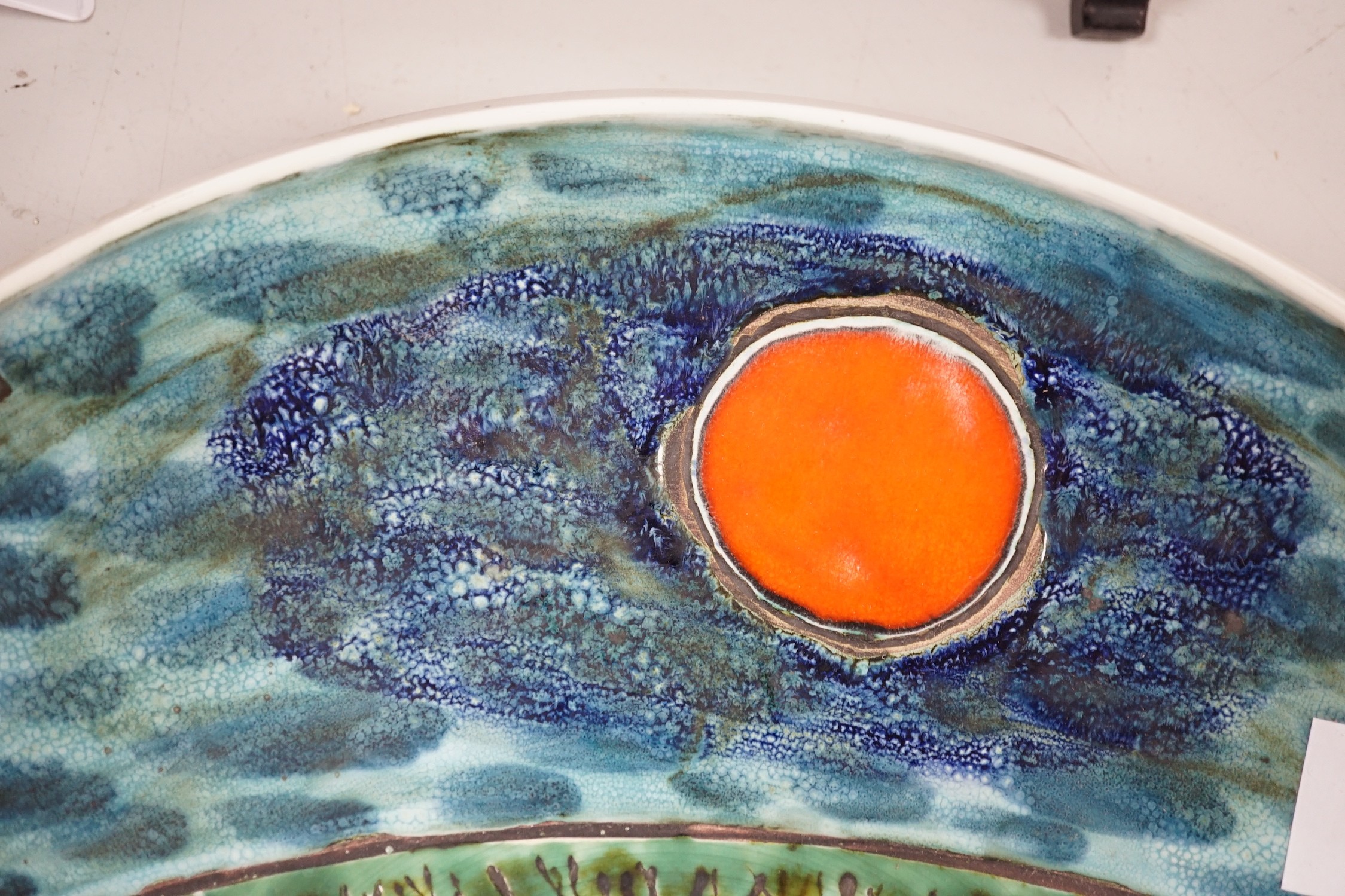 A large Poole pottery charger, 41cms diameter